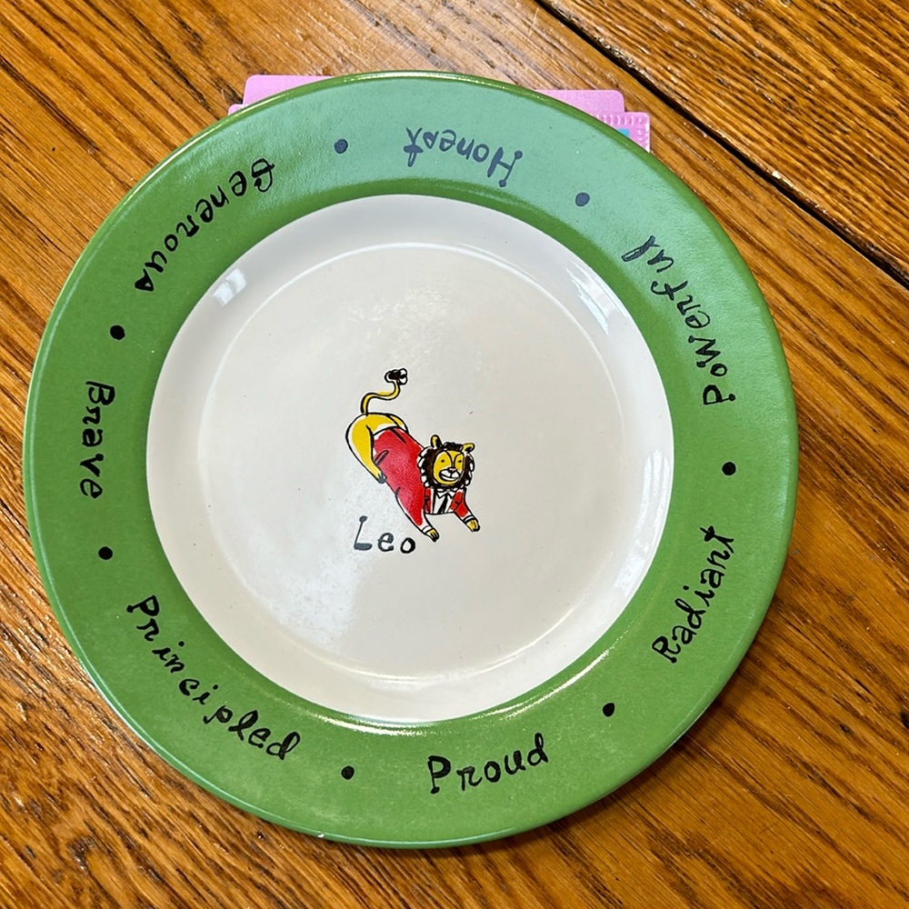 Pottery Barn What’s Your Sign zodiac plate. Leo with lion in center. 8”.